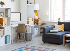 Hamptons living room with study desk and oak flooring