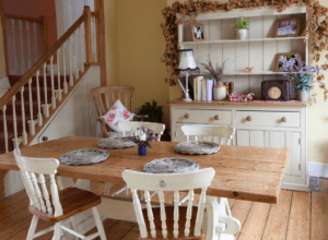 Shabby chic dining area with raw solid timber floorboards