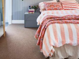 Hero image of carpet in a bedroom.